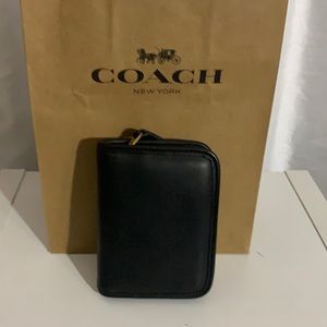 Coach black leather travel case